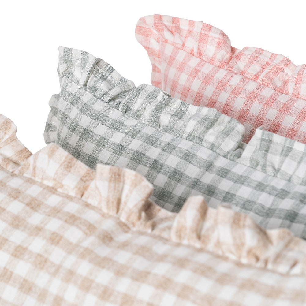 Gingham ruffle cushion styled on a linen bed, Clementine by Decor Petit