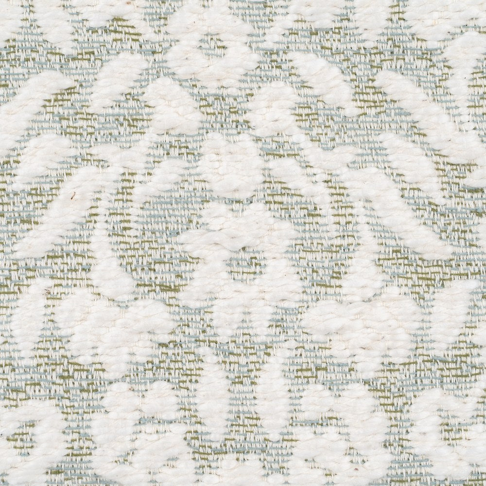 Grey and white boucle cushion cover with tufted floral pattern by Decor Petit